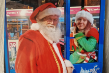 Thomas and Frances dressed as Santa and an Elf