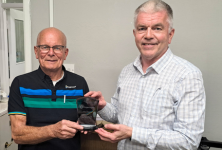 Paul Keane receiving plaque from Stagecoach South, Guildford Operations Manager, Graham Harmer