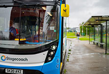A photograph of a Stagecoach bus by a bus stop