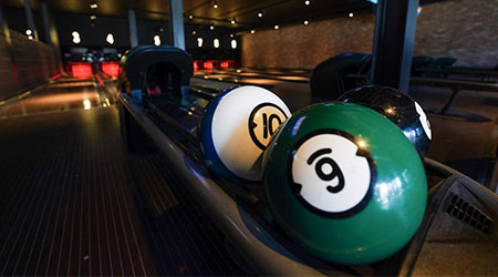 A photograph of bowling balls at a bowling alley at The Light in Banbury