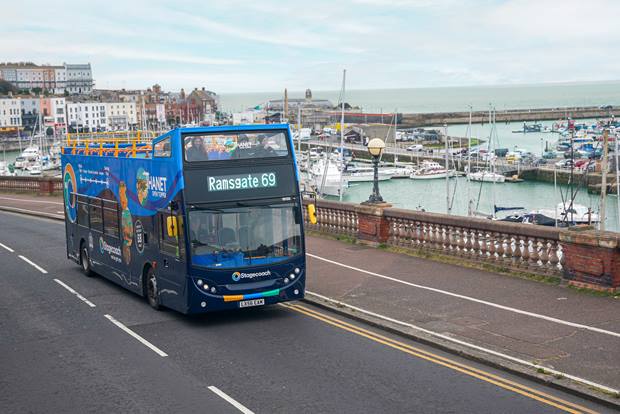 Thanet Open Topper with new navy livery travelling along Ramsgate Harbour