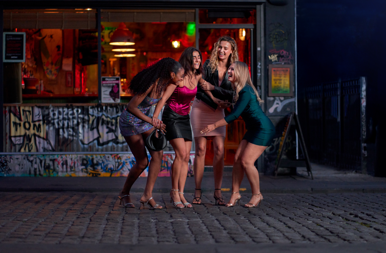 girls laughing in the street