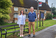 Cllr and resident at bus stop in Banbury